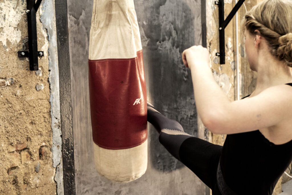Muay Thai training for kids in Sidekick.
Color photography.